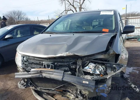 2012 Honda Odyssey Ex-L from USA, damaged, VIN 5FNRL5H64CB112083